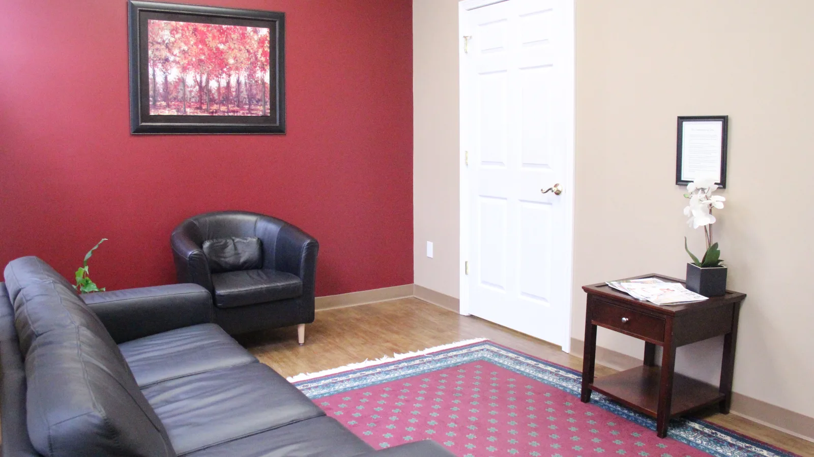 Welcoming waiting area at our Fall River center with comfortable seating and warm lighting